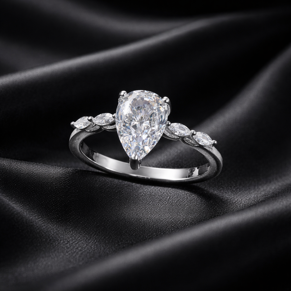 Pear Cut Solitaire Ring with Side Stones