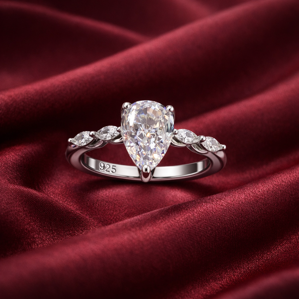 Pear Cut Solitaire Ring with Side Stones