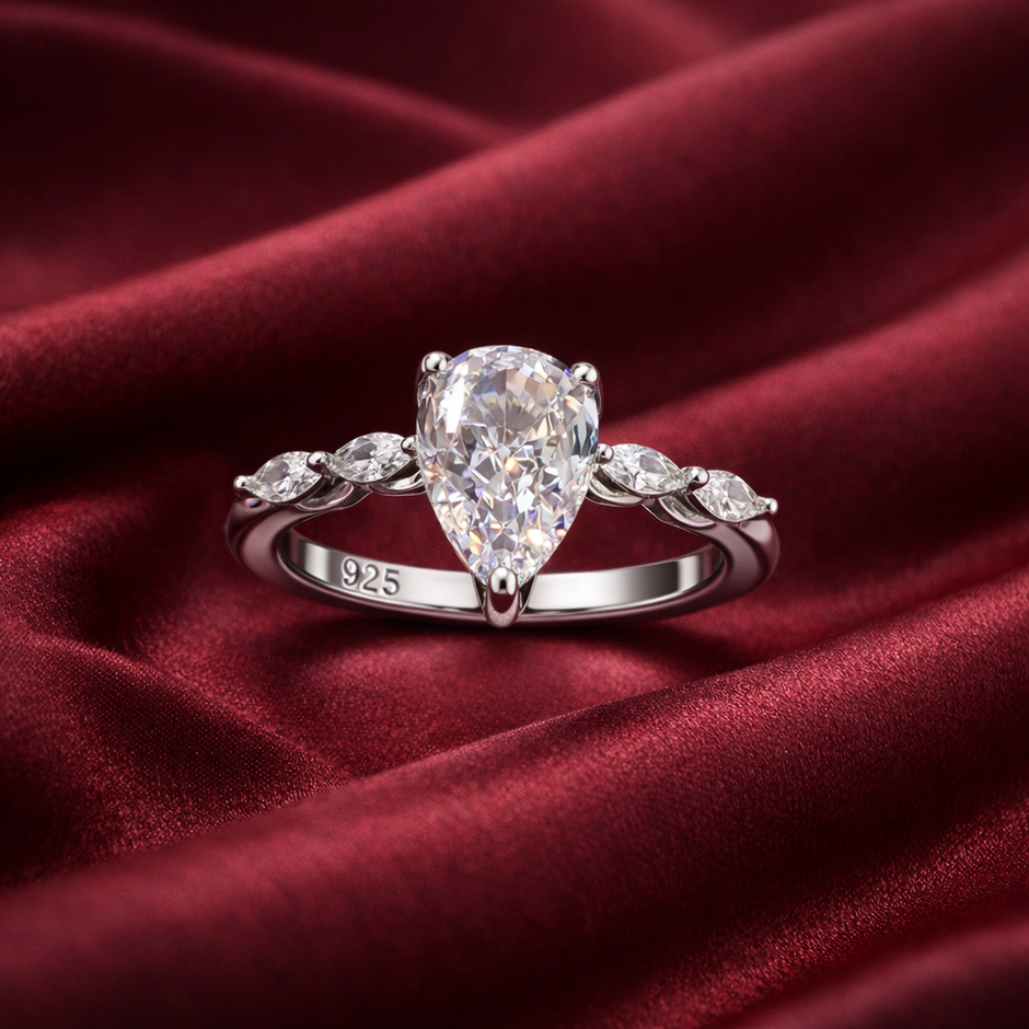 Pear Cut Solitaire Ring with Side Stones