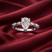 Pear Cut Solitaire Ring with Side Stones