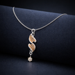 Double Helix Pendant Necklace with Rose Gold Accents