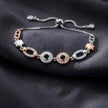 Dual-Tone Mixed Charm Evil Eye Slider Bracelet