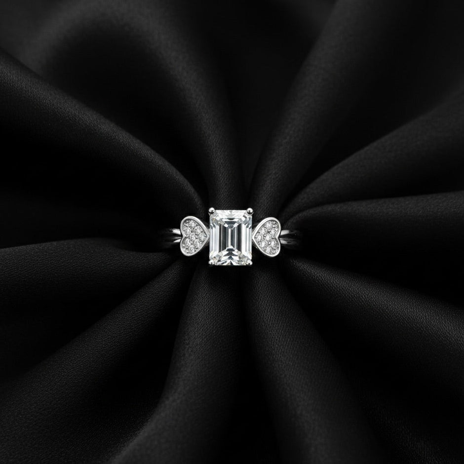 Emerald Cut Solitaire Silver Ring with Pave Heart Accents