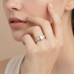 Emerald Cut Solitaire Silver Ring with Pave Heart Accents