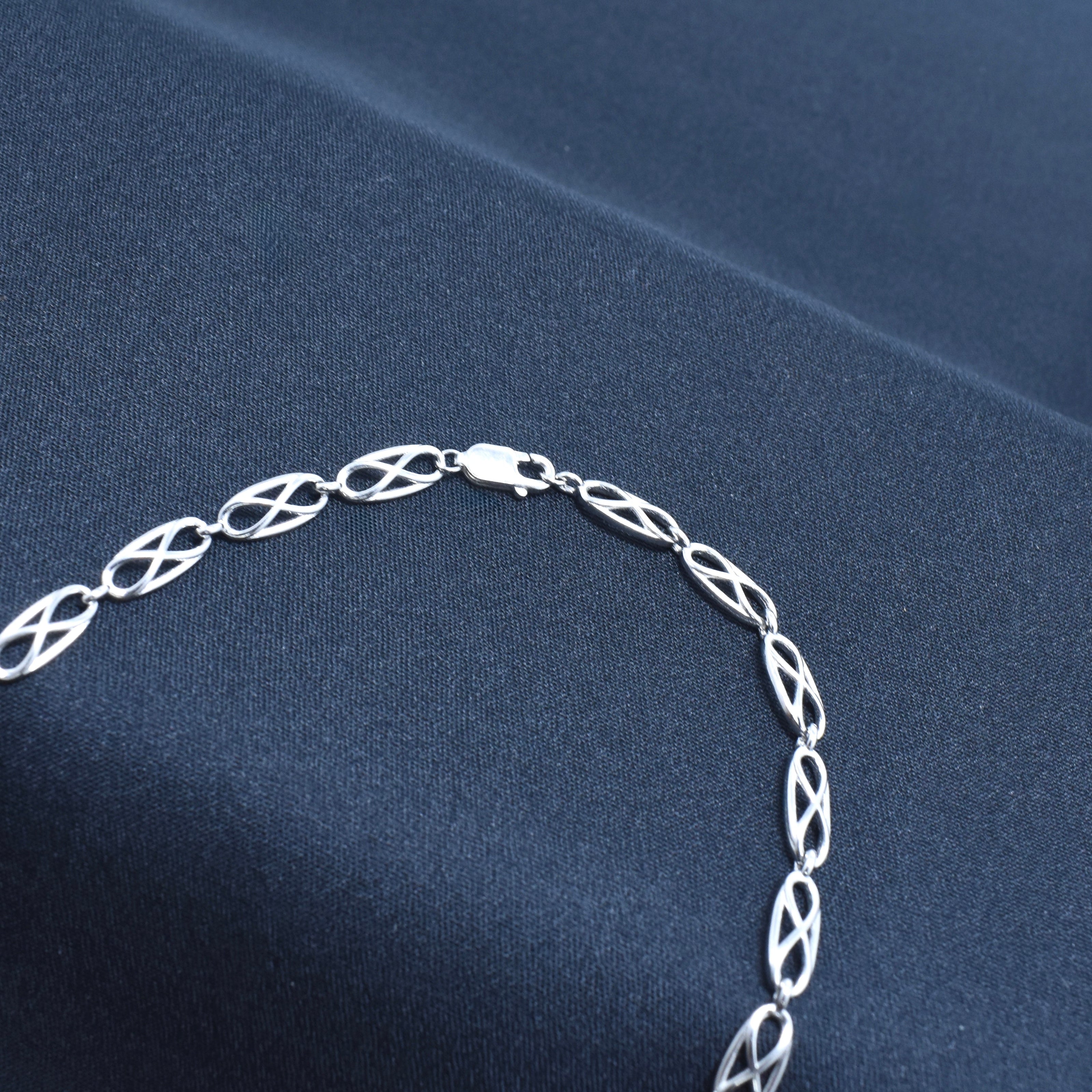 Polished Criss - Cross Silver Chain