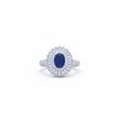 Oval Blue Stone Halo Ring with Baguette Surround