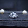 Round Cut Halo Ring with Blue Accent Stones