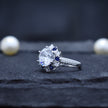 Round Cut Halo Ring with Blue Accent Stones