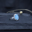 Oval Cut Sky Blue Stone Halo Ring