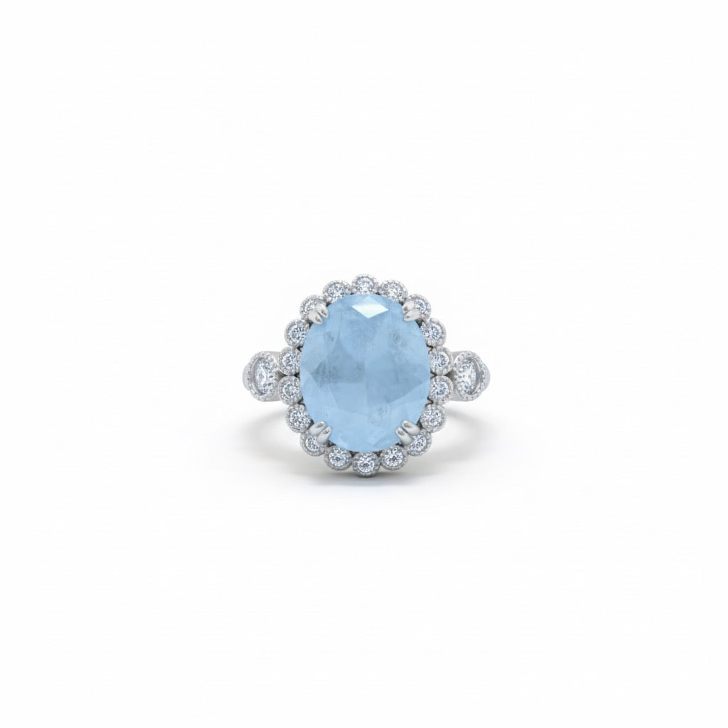 Oval Cut Sky Blue Stone Halo Ring