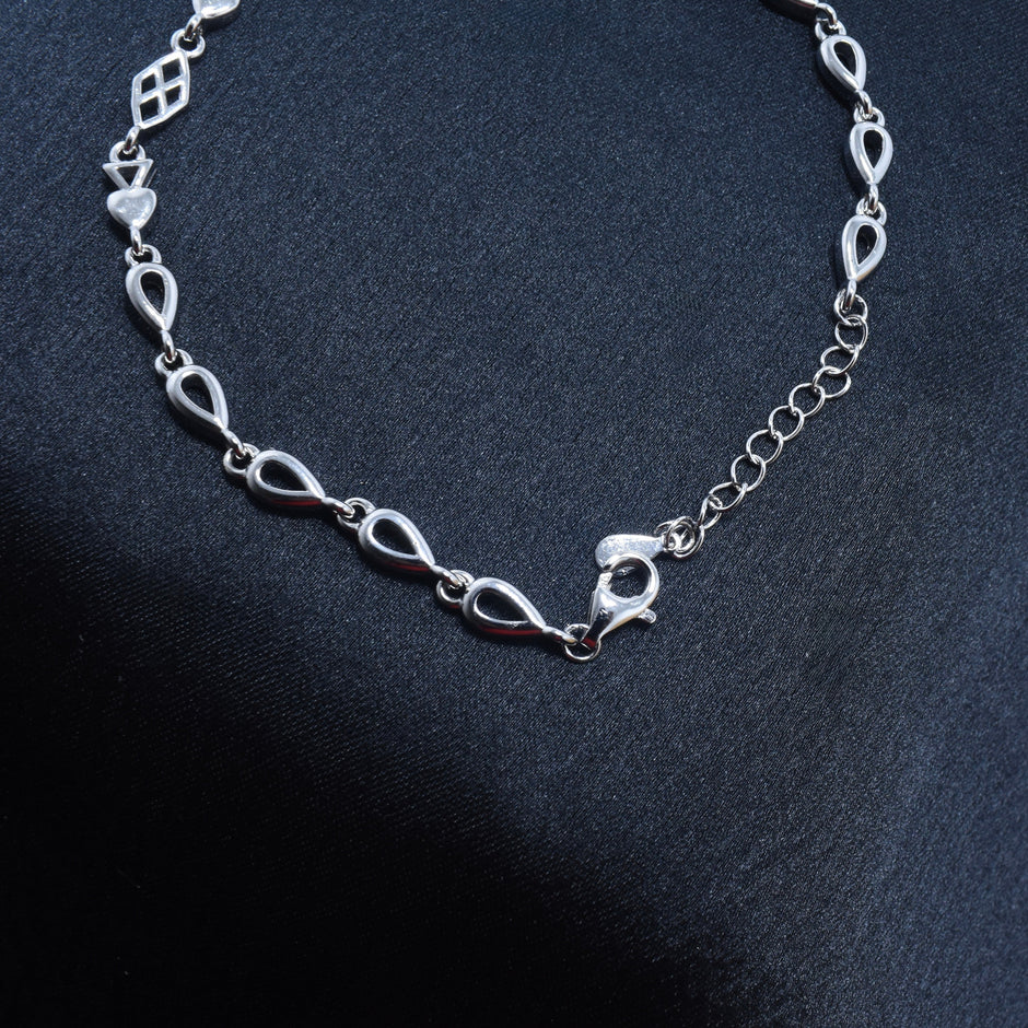 Elegant Multi-Shape Sterling Silver Bracelet