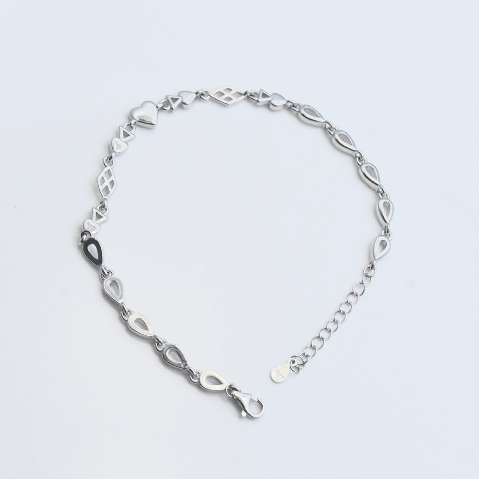 Elegant Multi-Shape Sterling Silver Bracelet