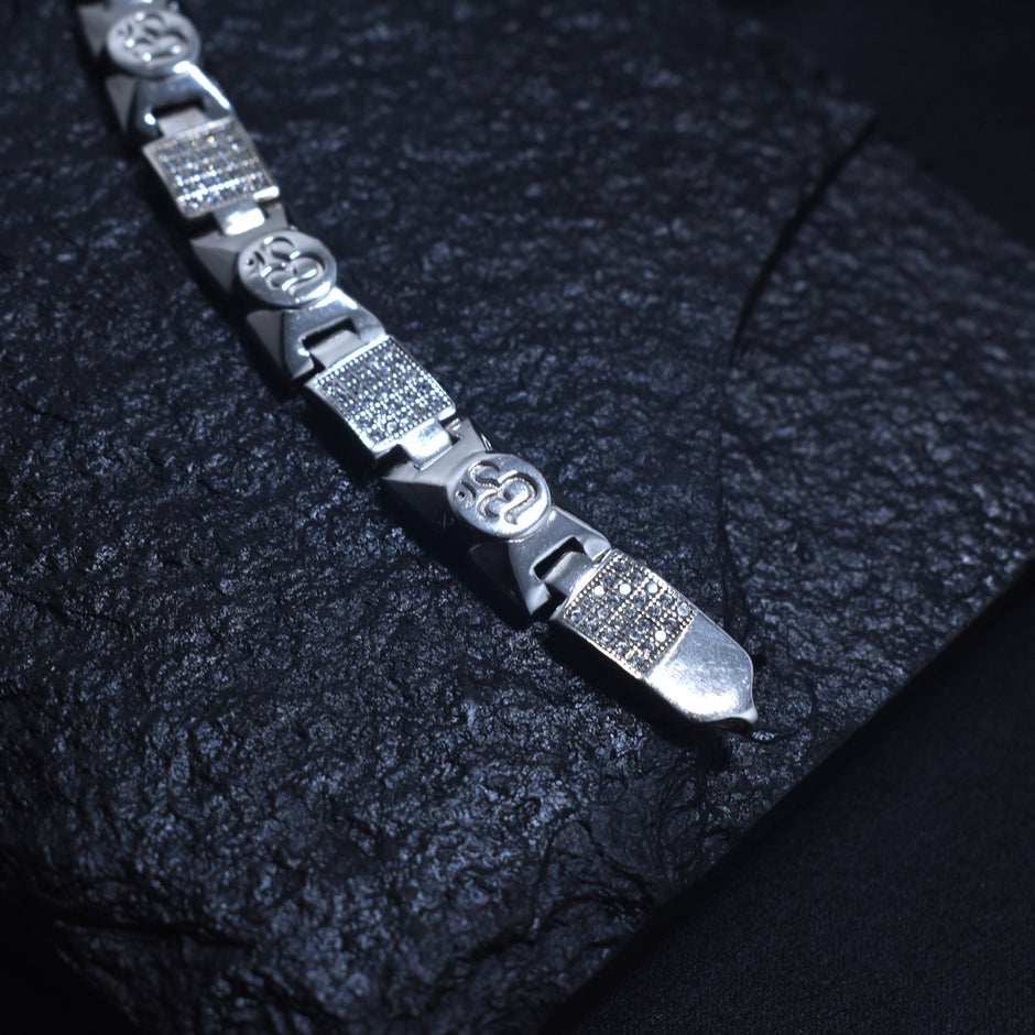 Om Motif Silver Bracelet